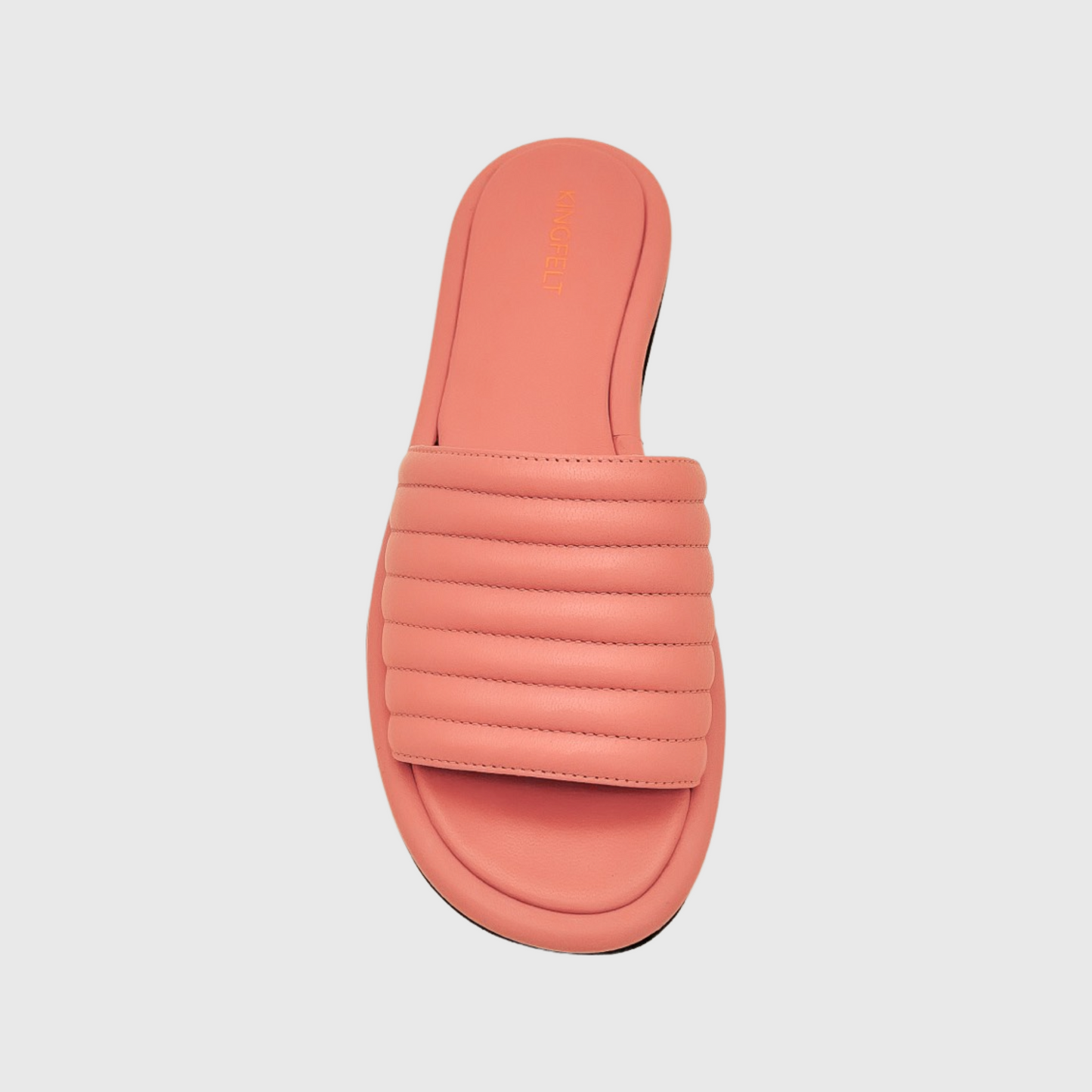 Korallrosa slip-in sandal med öppen tå i nappaskinn. Tillverkad i italien med guldlogga på hälen.